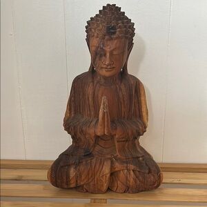 Serene Wooden Buddha Sculpture